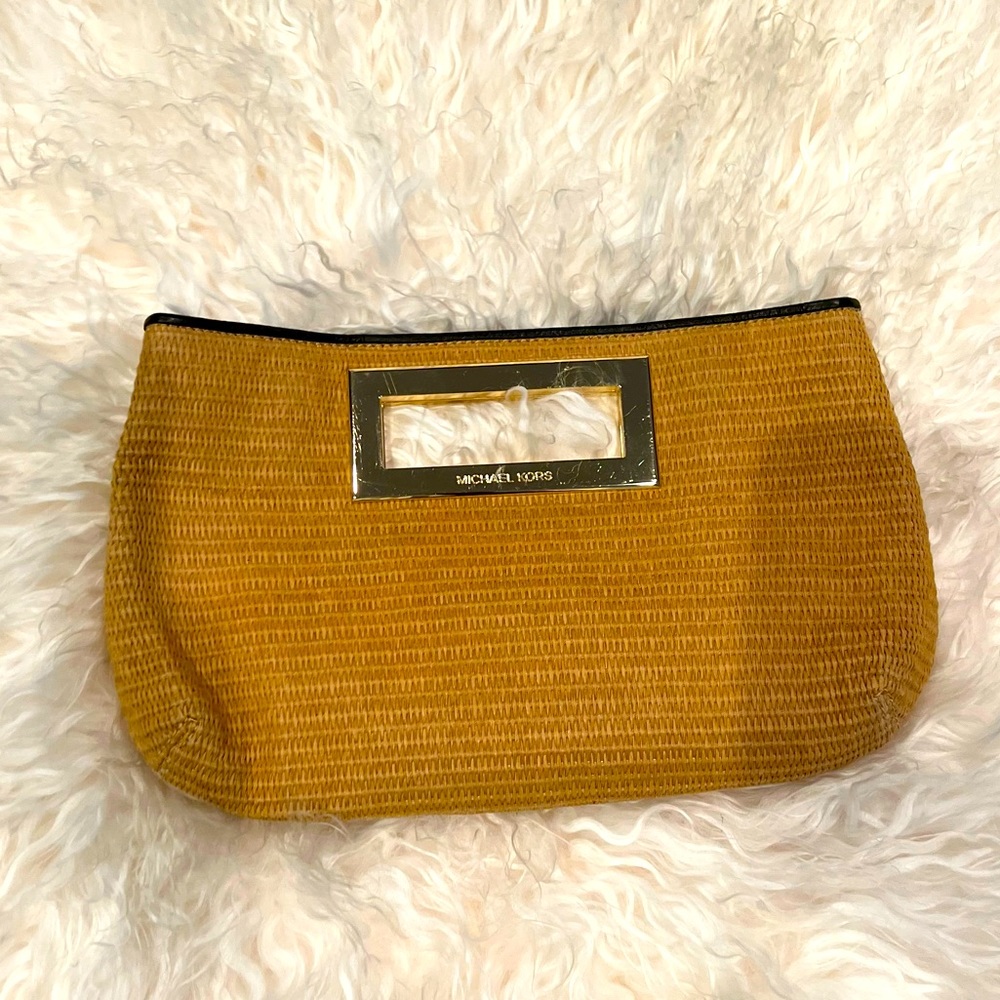 Tan Micheal Kors clutch Perfect for a Picnic